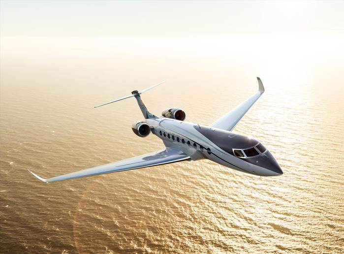 Image of an airplane flying over a waterbody